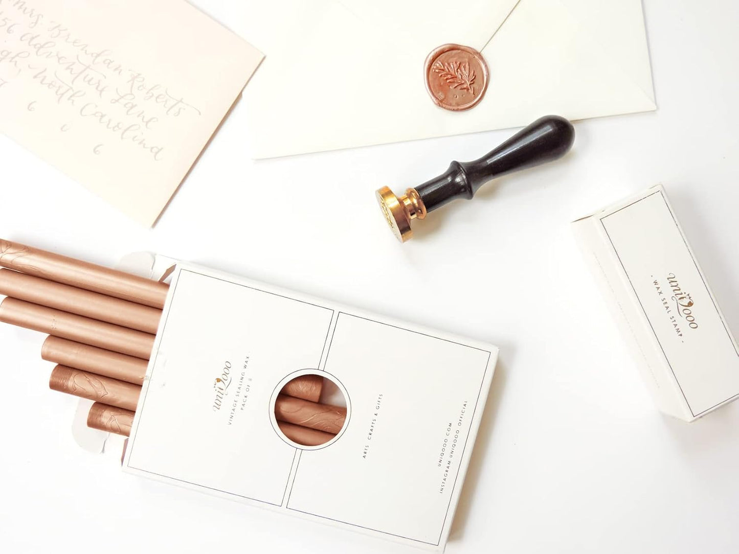 UNIQOOO Metallic Rose Gold Glue Gun Sealing Wax Sticks for Wax Seal Stamp - Great for Wedding Invitations, Cards Envelopes, Snail Mails, Wine Packages, Christmas Gift Ideas, Pack of 8